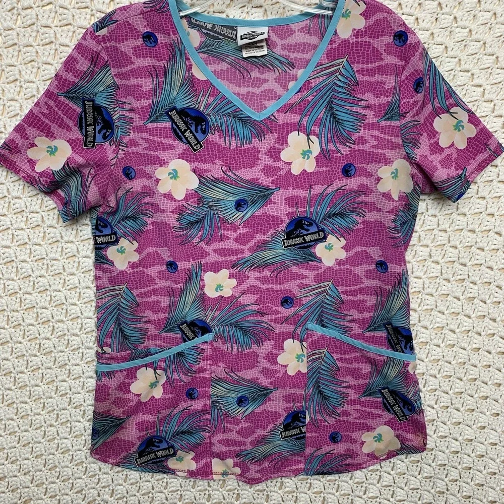 Jurassic Scrub Top Sz S Park Dominion Universe Studio Dino Skin Floral Pink Blue